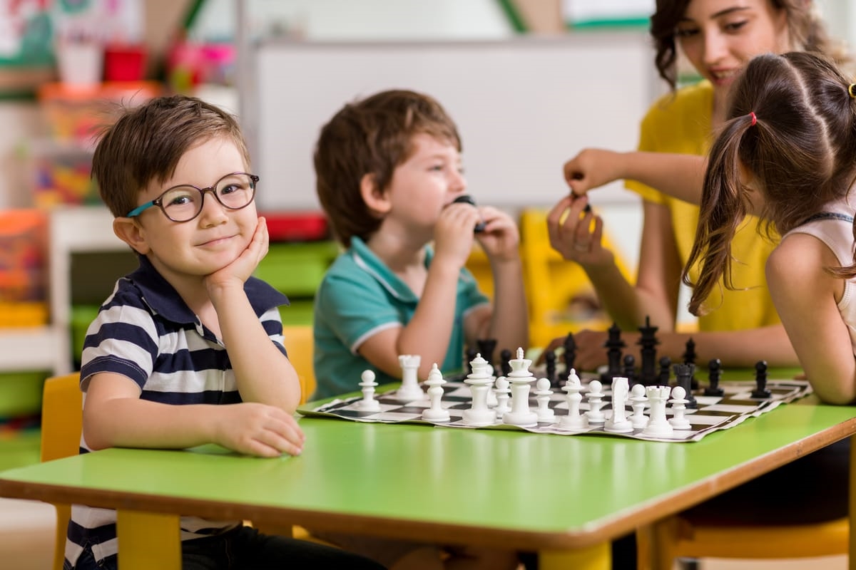 Childs playing chess.